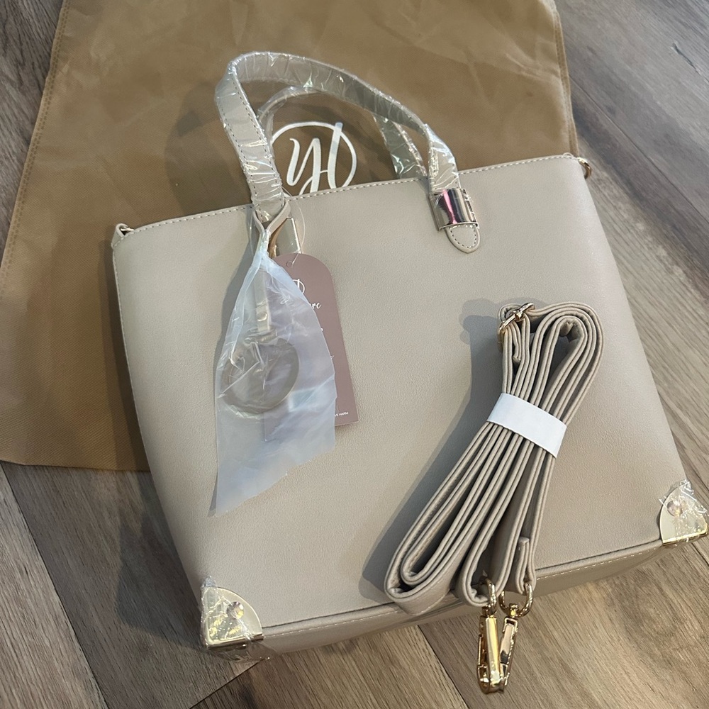 Elegant Beige Handbag with Gold Accents